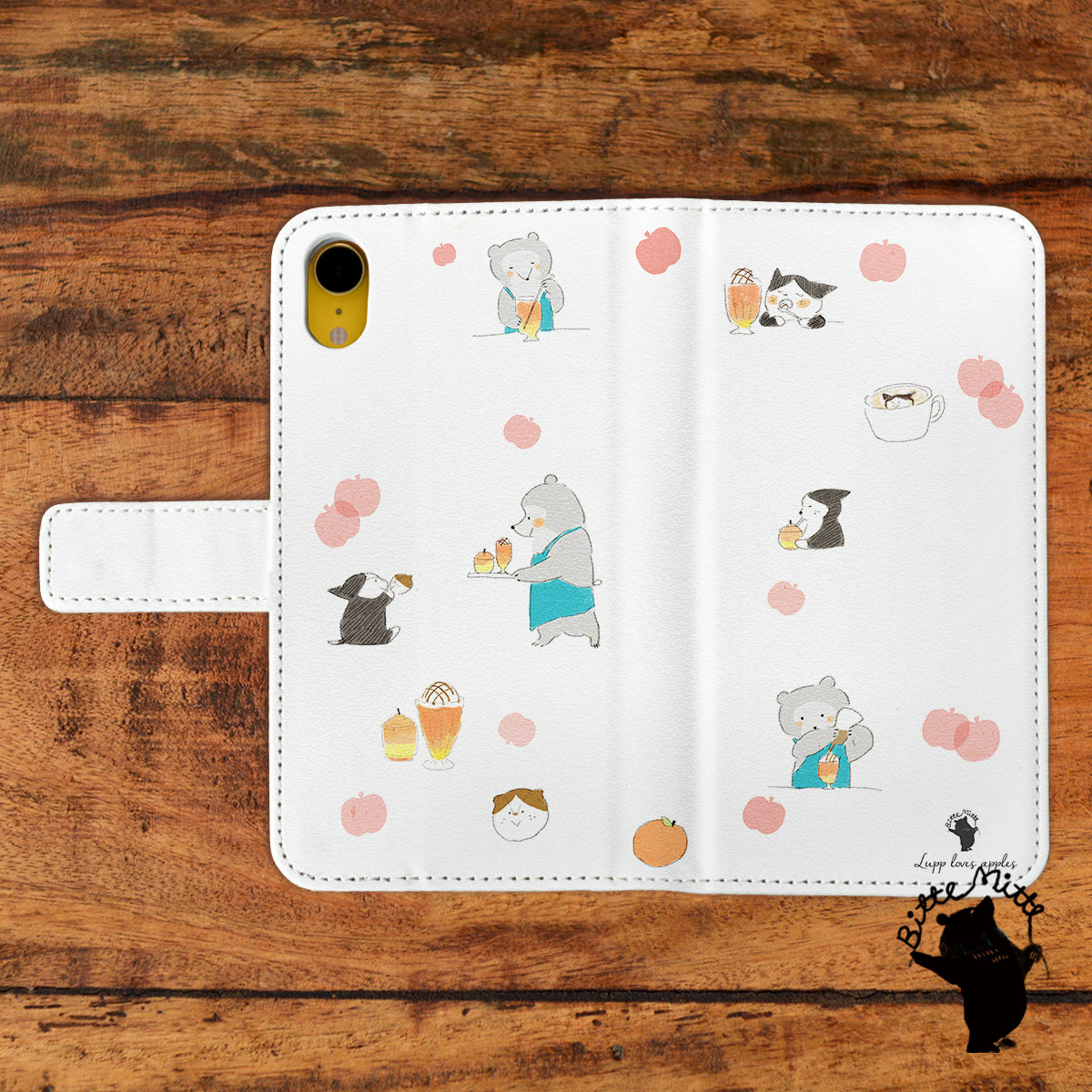 Bitte Mitte!ブランドのデザイン画を印刷したはめ込み式手帳型スマホケース「ヨルンとルップのりんごカフェ」のイメージ写真です。機種はiPhoneXRです。